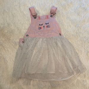 OshKosh Bunny overalls.